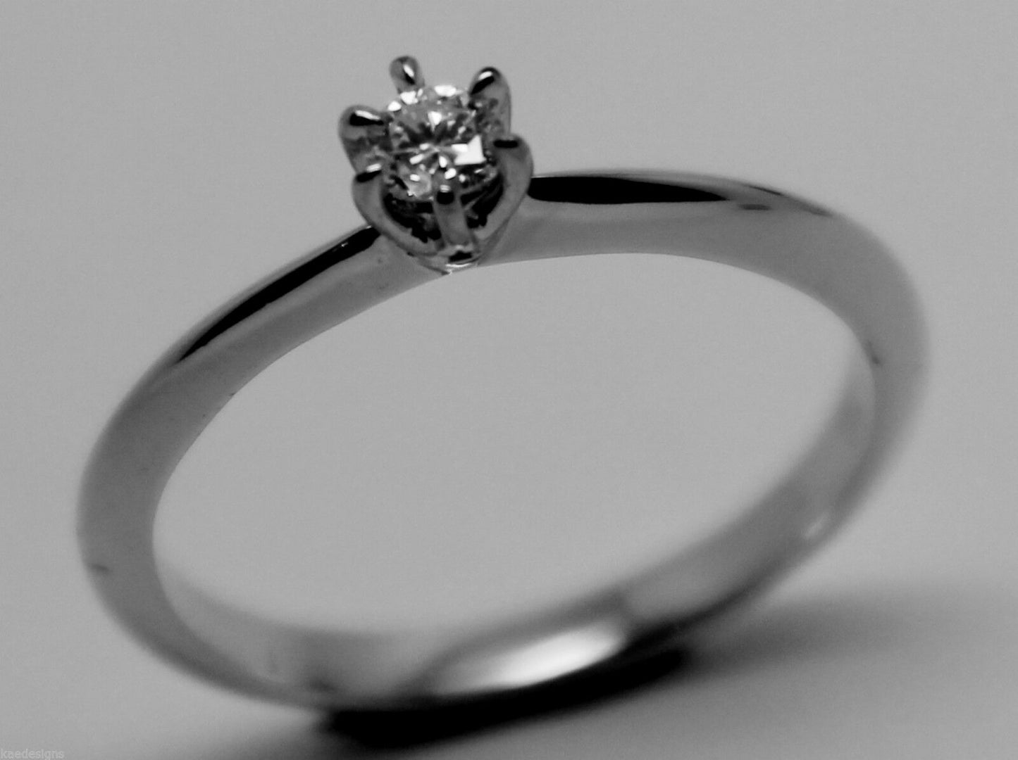 GENUINE NEW Solitaire .10 carat Round Diamond Ring 18K 18ct 750 WHITE Gold