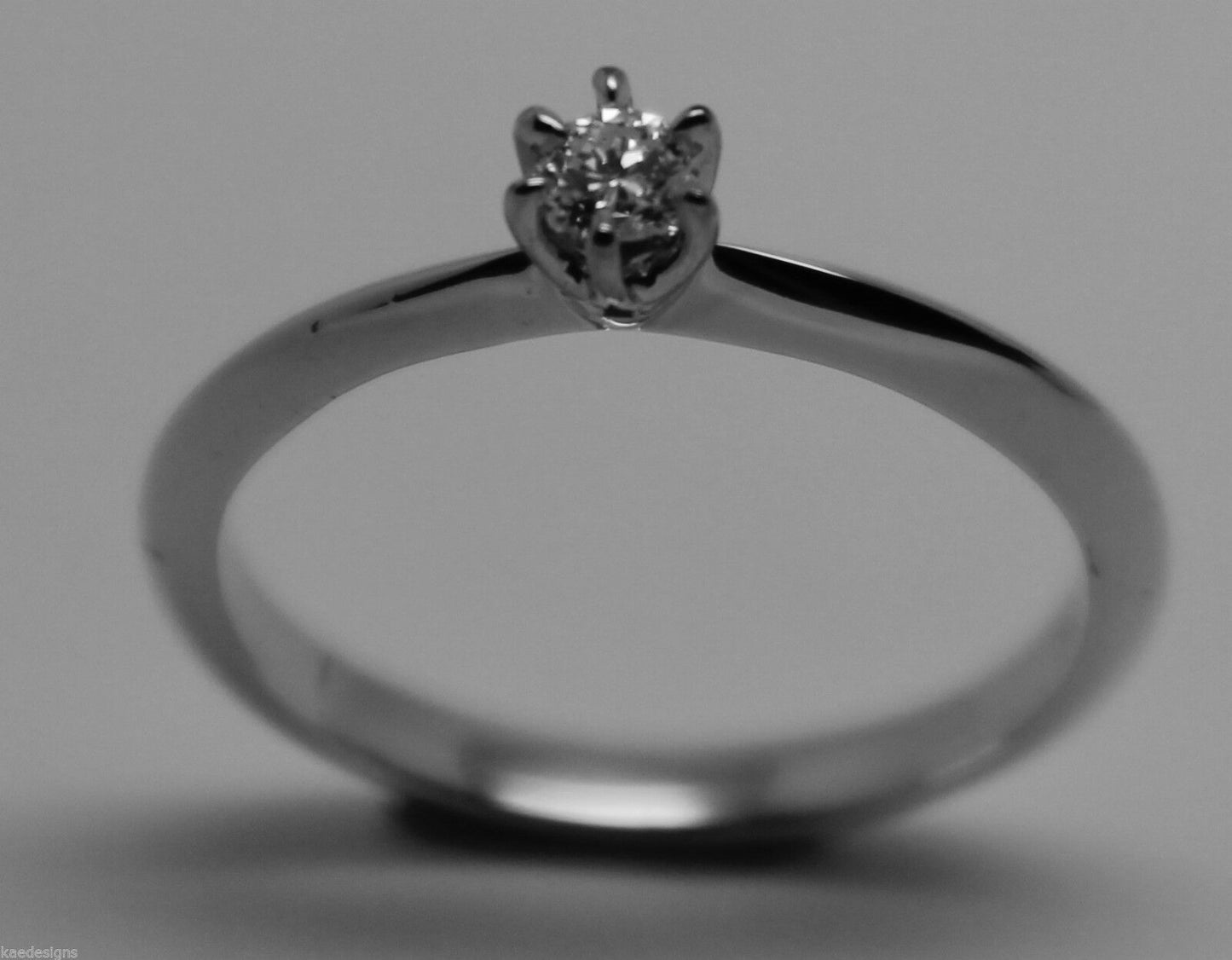 GENUINE NEW Solitaire .10 carat Round Diamond Ring 18K 18ct 750 WHITE Gold