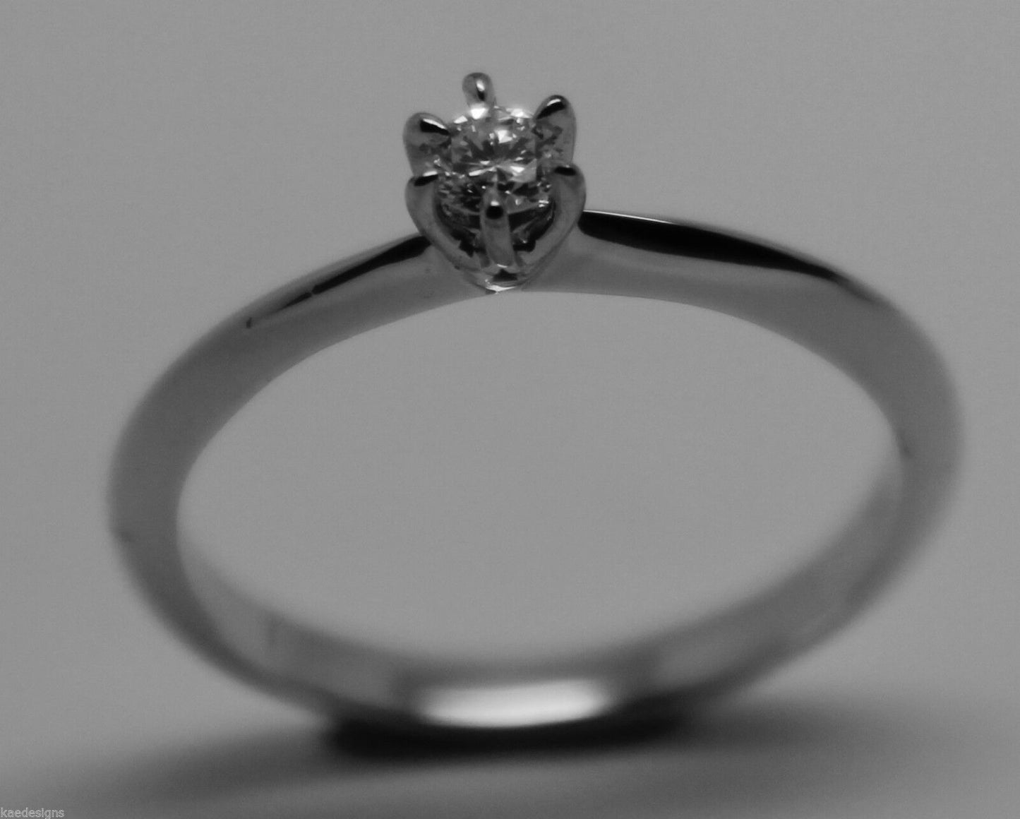 GENUINE NEW Solitaire .10 carat Round Diamond Ring 18K 18ct 750 WHITE Gold