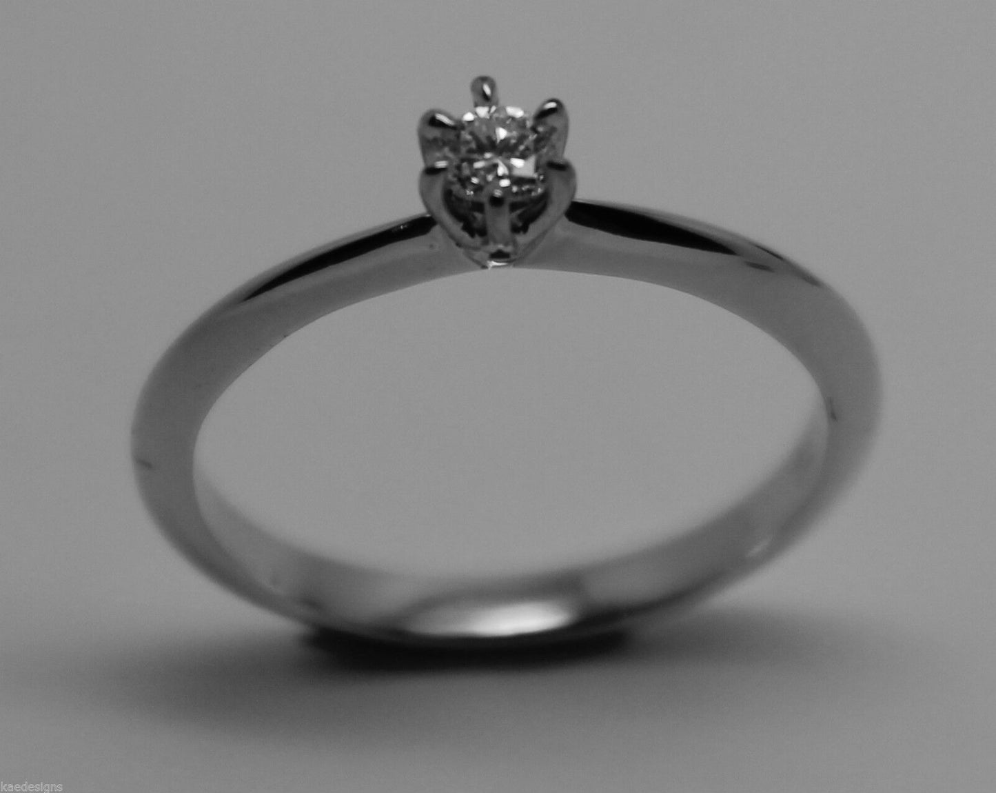 GENUINE NEW Solitaire .10 carat Round Diamond Ring 18K 18ct 750 WHITE Gold