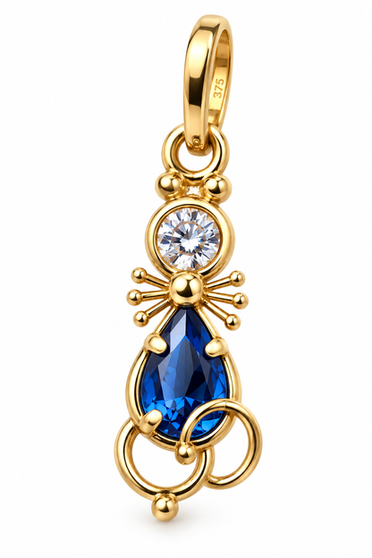 9ct yellow gold cat pendant charm with blue and clear cubic zirconias, whiskers and curled tail